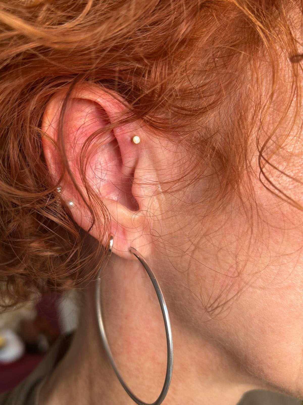 piercing nez, nombril, sein, oreille